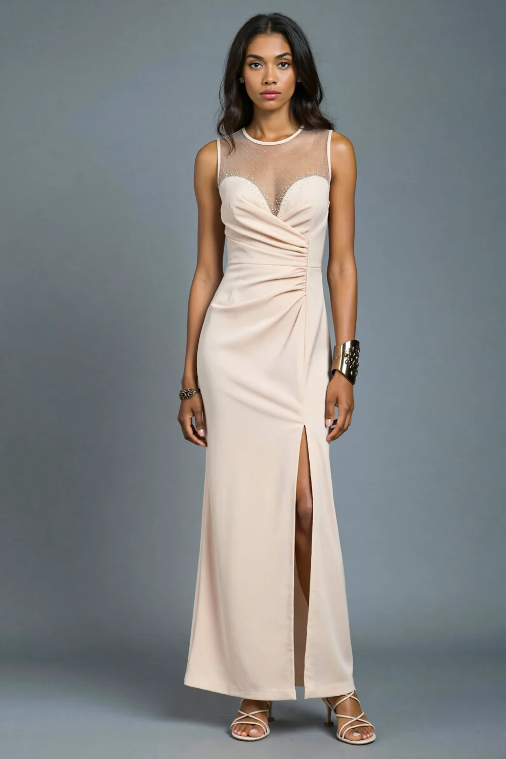 Sleek cream crepe column dress with sheer embroidered yoke, ruched bodice, and front slit for an elegant Halloween wedding guest look