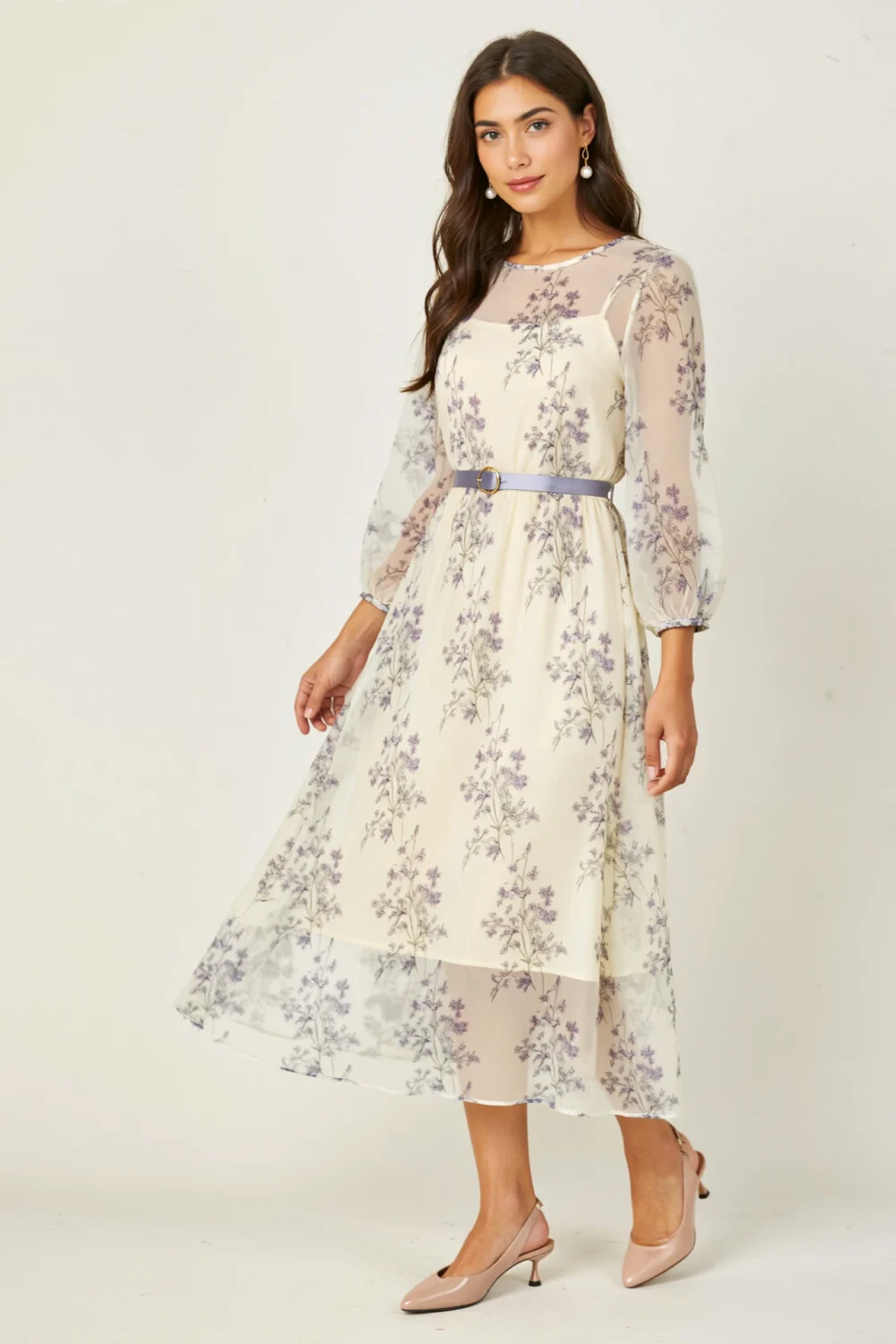 Ethereal floral midi dress with sheer blouson sleeves, lilac-gray botanicals, and a dove-gray waist ribbon for graceful elegance