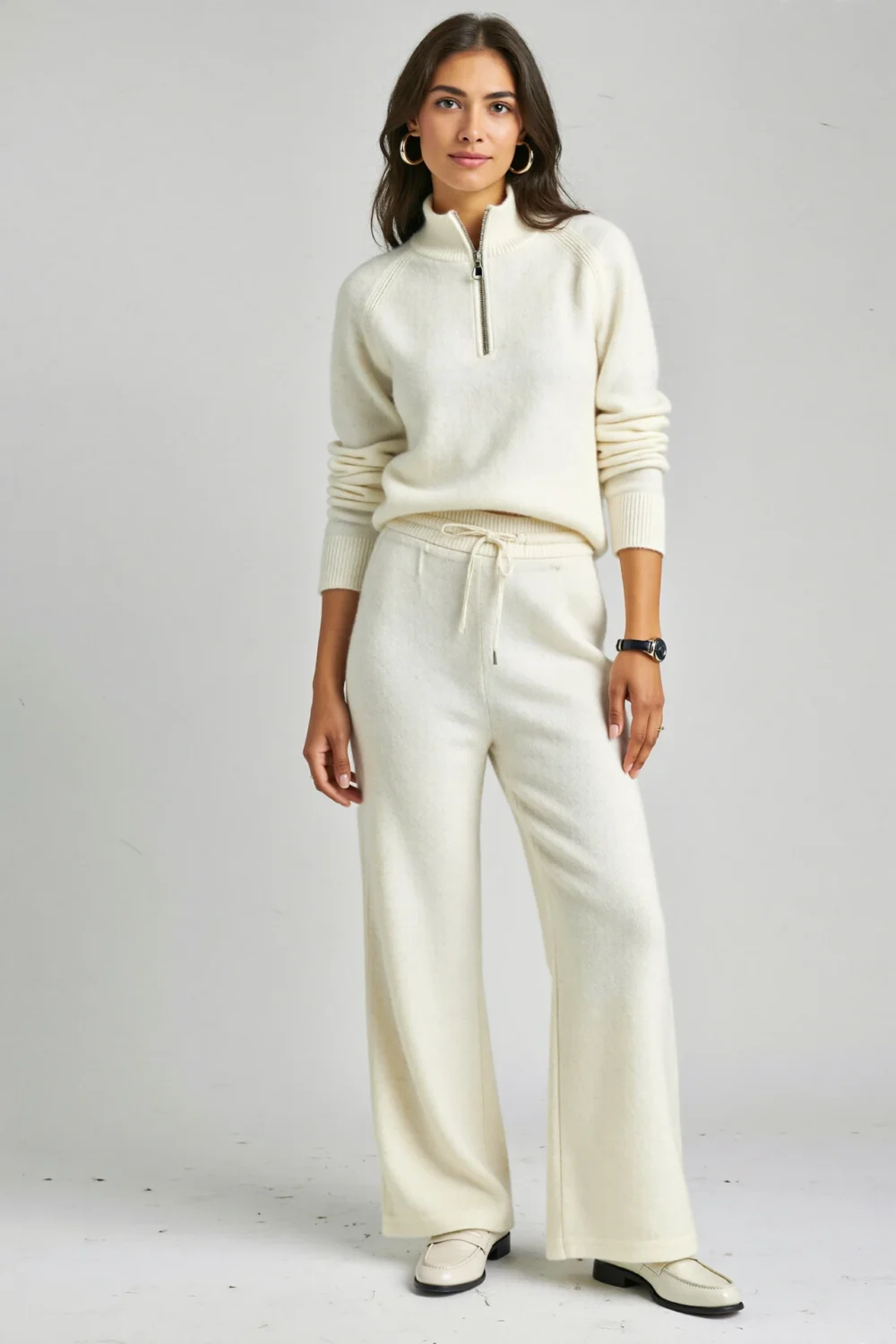 Cream knit matching set with half-zip sweater and wide-leg pants, styled as a sleek, relaxed outfit for effortless chic looks
