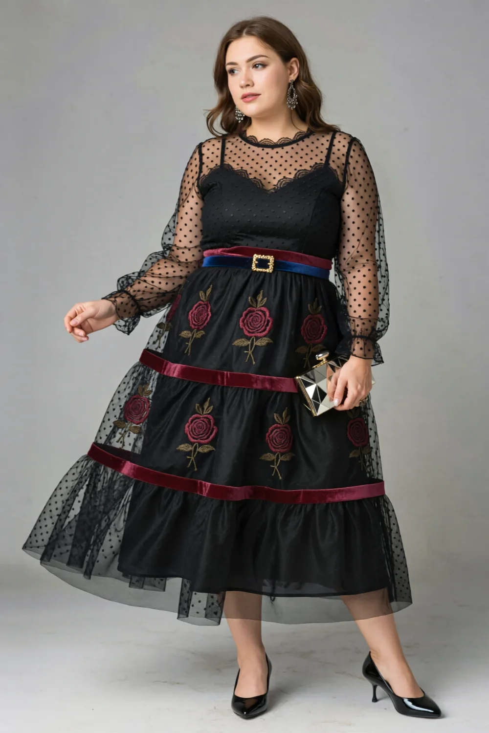 Black tea-length tulle midi dress with Swiss-dot sleeves, velvet ribbon trim, and dark rose embroidery for evening wedding style