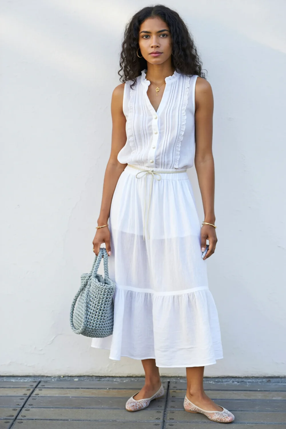 White pintucked voile maxi skirt set with waist cord, embroidered mesh flats, and an ice-grey hobo bag for a soft, airy look